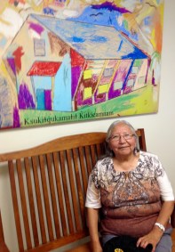 Dorothy Alpine, framed by a colourful rendition of the 'new' school